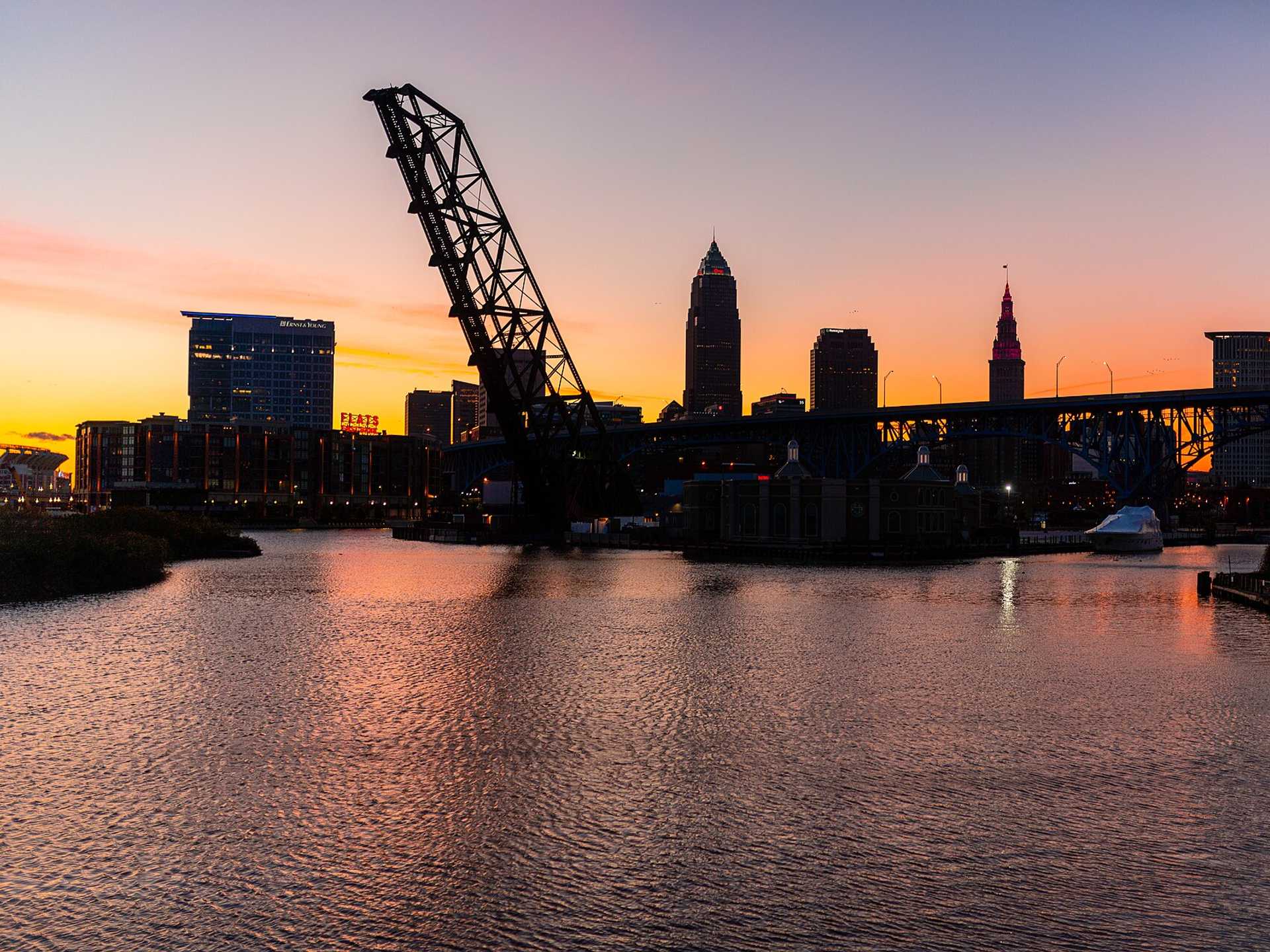 The Cleveland skyline at sunrise, seen from the Cuyahoga River